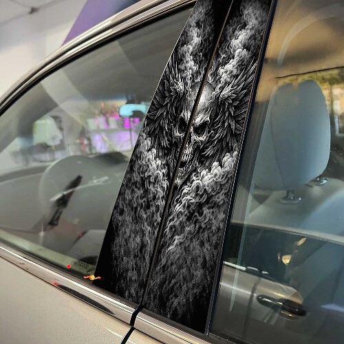 Vinyl Decal Sticker of a Skull with Wings and Smoke Pillar Doors